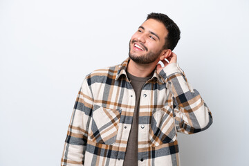 Young Brazilian man isolated on white background thinking an idea
