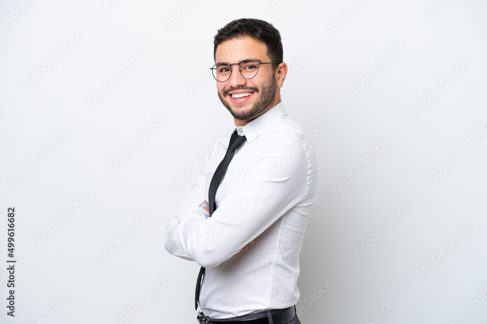 Wall mural Business Brazilian man isolated on white background with arms crossed and looking forward