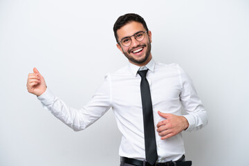 Business Brazilian man isolated on white background making guitar gesture