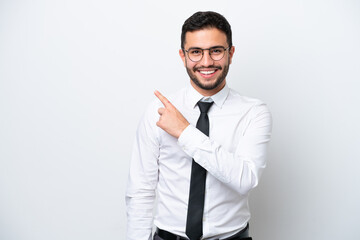 Business Brazilian man isolated on white background pointing to the side to present a product