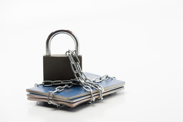 several passports of the citizen of Ukraine with an emblem on a wrapper locked with a chain and...
