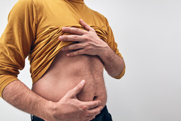 Fototapeta Man with belly stomach fat issues. obraz