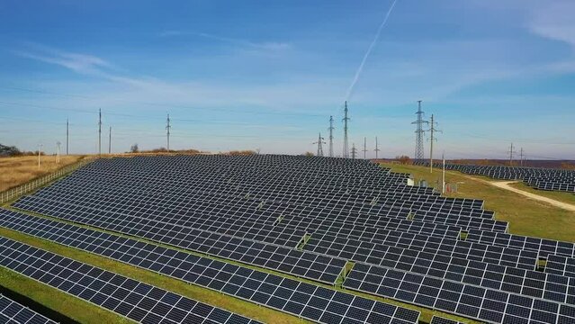 Aerial Drone view of Grid-connected solar power system, crane shot. Alternative energy.