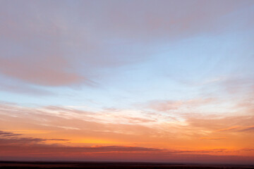 Dramatic sky with thick clouds after sunset