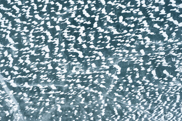 Winter landscape snow and frost. ice covered with snow, beautiful pattern on the ice