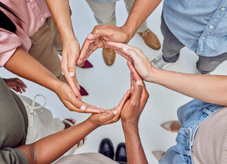 Teamwork makes everything flow easier. Closeup shot of a group of unrecognisable businesspeople...