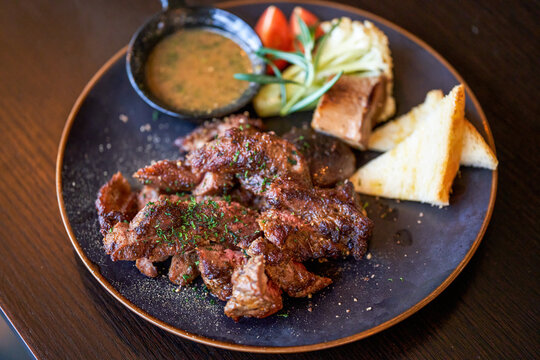 A delicious and tempting western steak, smoked grilled sirloin steak