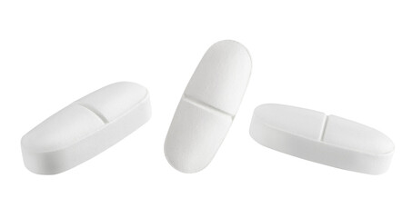 Set of white pills isolated on white background