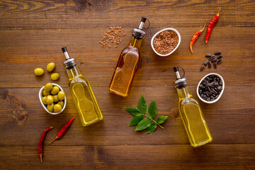 Bottles of cooking oil - sunflower olive and sesame oil with seeds