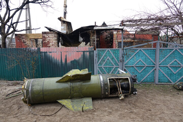 War in Ukraine. Big rocket on the street. Unexploded bomb in the village.