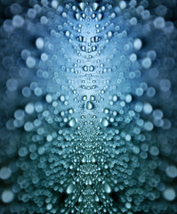 Abstract background of water drops with very shallow depth of field. Drops of liquid taken with selective focus.