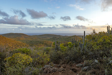 Sunrise over Christoffel National Park during the hike up to the top of Christoffel mountain on the...