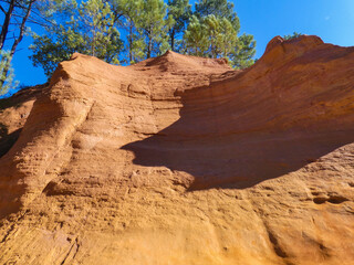 Provencal colorado on the ocher trail near the village of Roussillon in Provence in France 