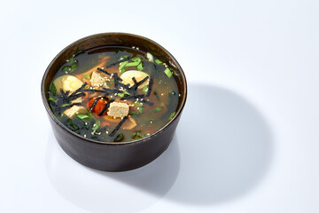 Japanese Cuisine - Miso Soup with Seaweed, Mushrooms and Tofu Cheese