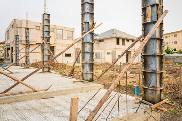Fototapeta premium building process of a house column in construction site on housing project