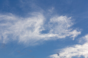 white fluffy clouds in the blue sky, nature background
