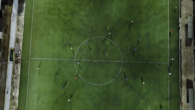 teen soccer players train in a friendly game overnight
