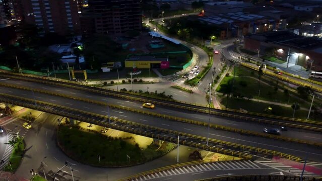 roundabout illuminated at night. Large structure in operation in the city of Medellin