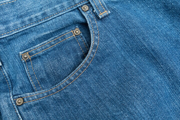 Denim pocket with seam of fashion design. Jeans background texture.