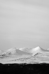 Rondane Mountains in Rondane National Park, Oppland, Norway, covered with snow.