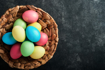 Easter eggs. Dyed Easter eggs with marble stone effect ref and blue color in rustic style on dark...