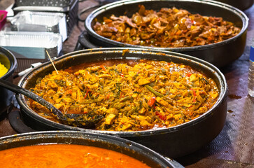 A variety of street foods at Brick Lane Market in London
