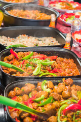 Meatballs curry served with rice at Brick Lane market in London