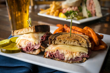 Close Up of Reuben Sandwich with Sweet Potato French Fries
