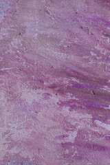 Old flaky wall with destroyed plaster. Renovation of old house. Industrial style design wall background. Grunge cracked concrete wall with old paint. Shabby peeling old background