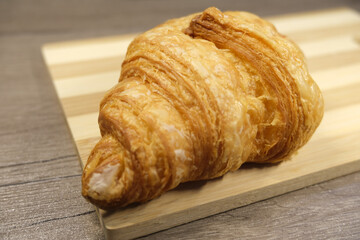 croissant on wooden table