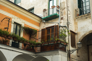 Ancient streets of the southern sea city. Lovely houses with shutters. Tourism in old Europe -...