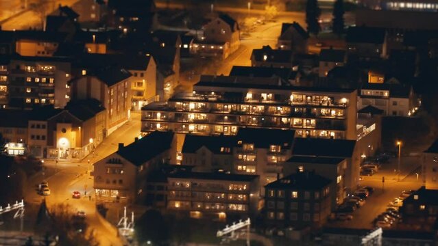 Narvik at night. Brightly lit streets and buildings.  A time-lapse video.