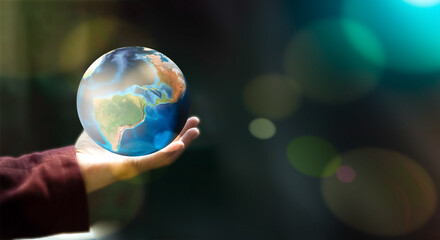 Safe world concept, Earth was held in human hands. Earth day. Energy-saving concept, Elements of...