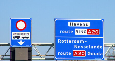 Blue direction and information sign for the directions on Motorway A16 Nesselande and Gouda