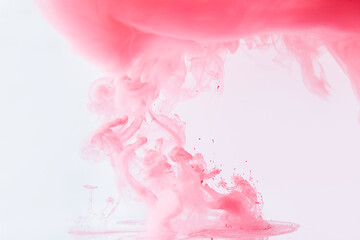 background. clouds of pink smoke on a white background