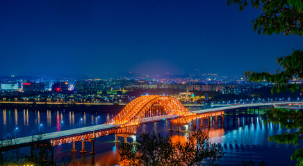 Fototapeta na wymiar Bridge of Seoul Banghwa bridge beautiful Han river at night, Seoul, South Korea.