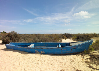 Naklejka na ściany i meble Traditional fishing boat in the Ria zone , Fuseta, Algarve - Portugal 