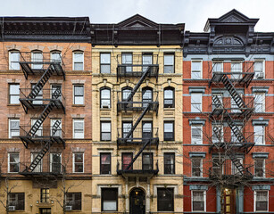 Exterior view of old brick apartment buildings in the East Village neighborhood of New York City - 499652831