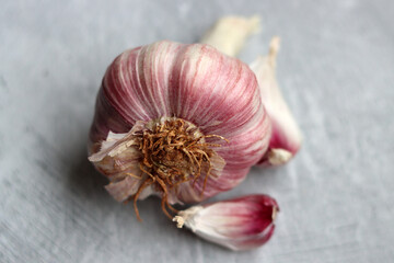 Garlic bulb on a table. Garlic texture close up photo. 