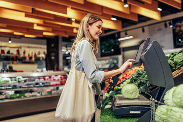 Woman shop at indoors vegetable and fruit market