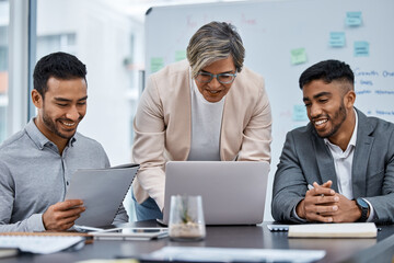 Let me pull up the plans so we can discuss further. Shot of a group of businesspeople working together on a laptop in an office.