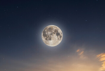 Beautiful full moon on the starry sky. Astronomical background.