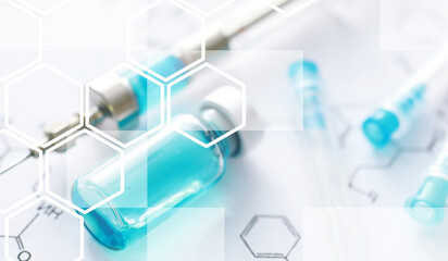 small jars with injection and syringe for injection on a blue background near the chemical formula