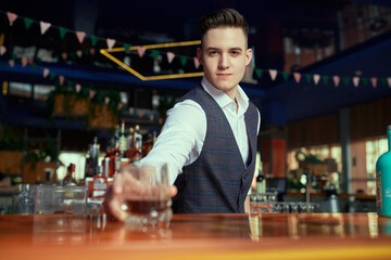 barman serves drink