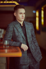 young businessman in bar