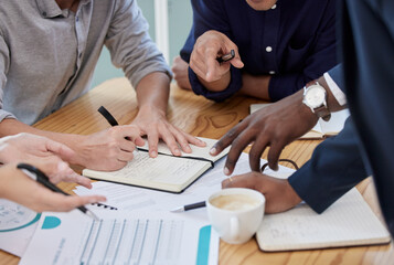 Brainstorming a way forward that works best. Closeup shot of a group of unrecognisable...