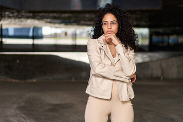 portrait upset in emotions latin girl with glasses