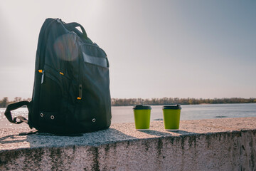 Backpacks glass of coffee