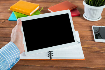 businessman with a tablet, works in the office