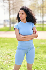 Portrait of beautiful fit girl, young slim fitness sports woman in sportswear, top outdoors going to training